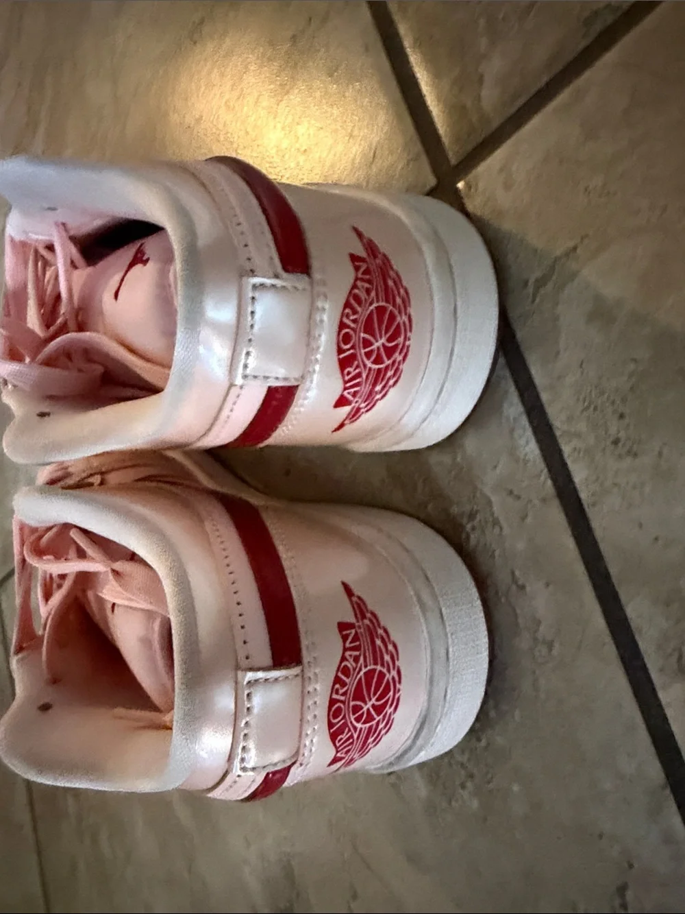 Nike Women’s Low-Top Sneakers in Light Pink with Burgundy Swoosh